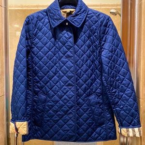 Burberry Brit jacket with Burberry traditional plaid on the inside.